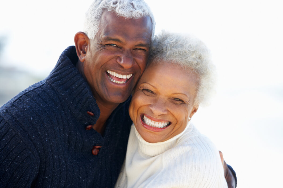 pros and cons of permanent dentures